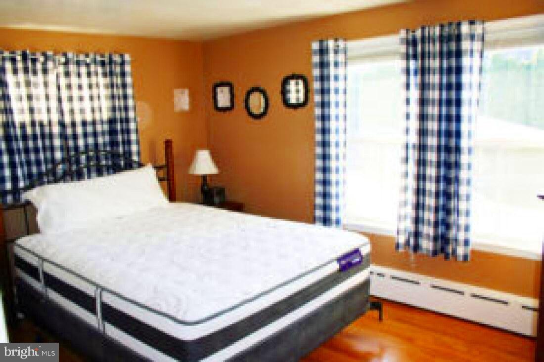 828 Weavertown Road Lebanon, PA 17046 - Photo 17 of 38 a bedroom with a bed and a window