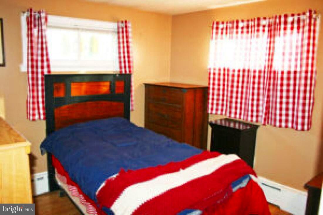 828 Weavertown Road Lebanon, PA 17046 - Photo 20 of 38 a bedroom with a bed and a television