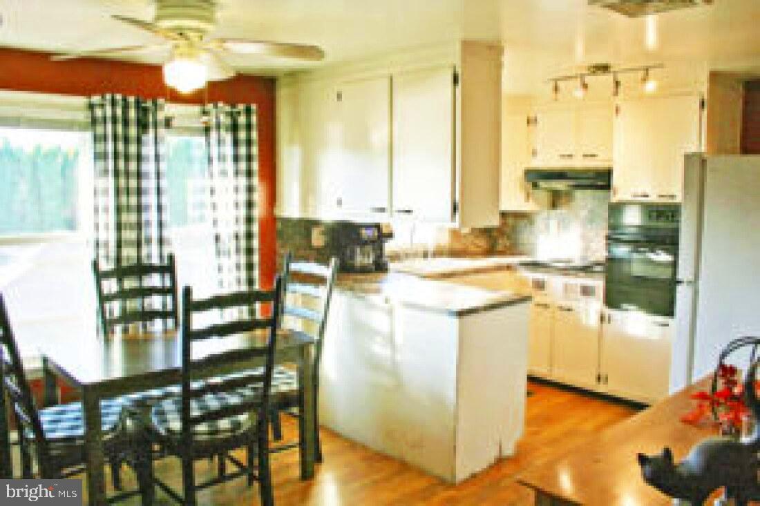 828 Weavertown Road Lebanon, PA 17046 - Photo 29 of 38 a very nice looking dining room with a large window and kitchen view