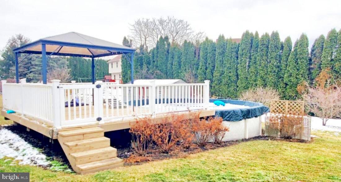 828 Weavertown Road Lebanon, PA 17046 - Photo 8 of 38 a view of a table and chairs in patio with a small yard