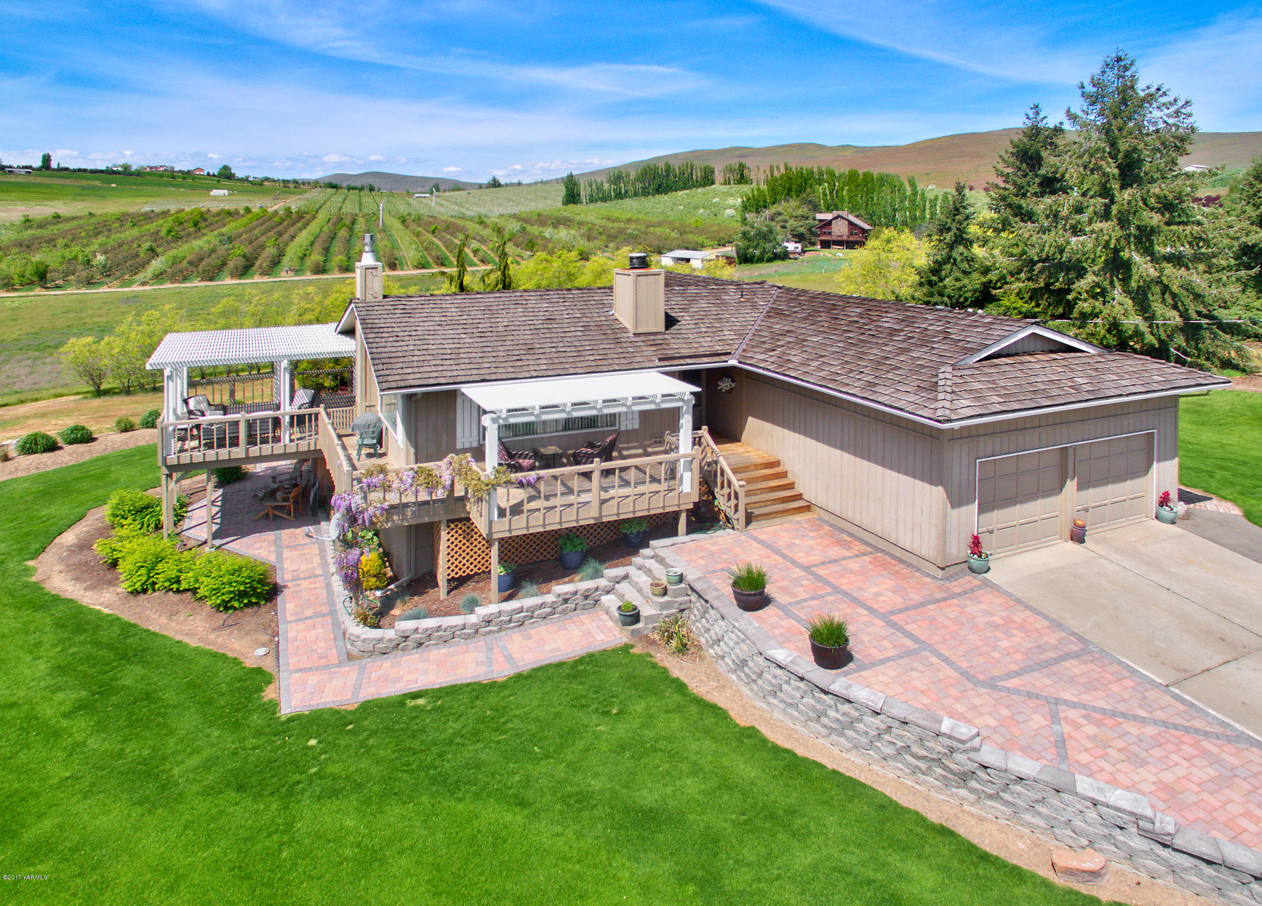 13621 Summitview Ext Road Yakima, WA 98908 - Photo 1 of 35 an aerial view of a house with a garden