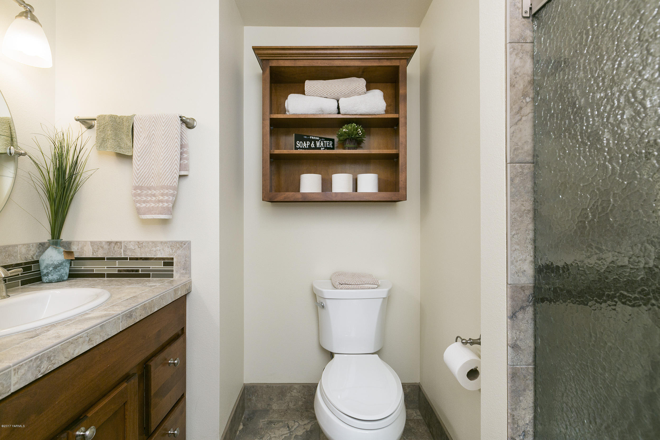 13621 Summitview Ext Road Yakima, WA 98908 - Photo 35 of 35 a bathroom with a granite countertop toilet sink and mirror