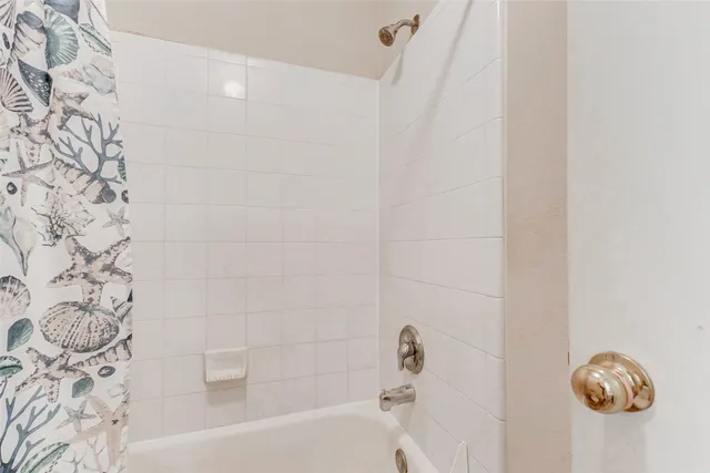 a bathroom with a bathtub