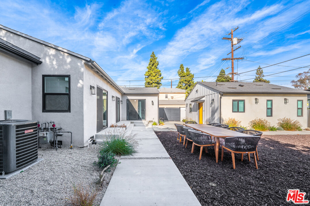 Undisclosed Address Los Angeles, CA 90008 - Photo 26 of 28 a view of a house with a barbeque grill and couches