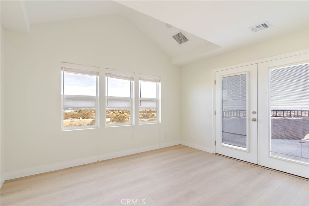 2575 Rale Drive Palmdale, CA 93550 - Photo 17 of 41 a view of an empty room with a window