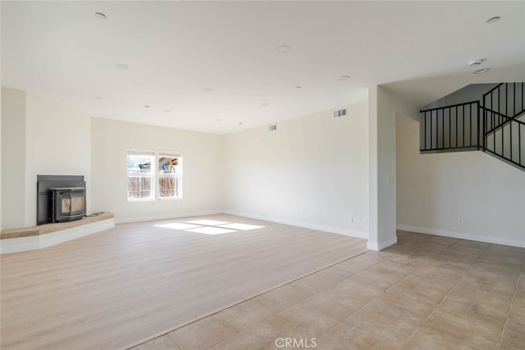 2575 Rale Drive Palmdale, CA 93550 - Photo 4 of 41 an empty room with windows