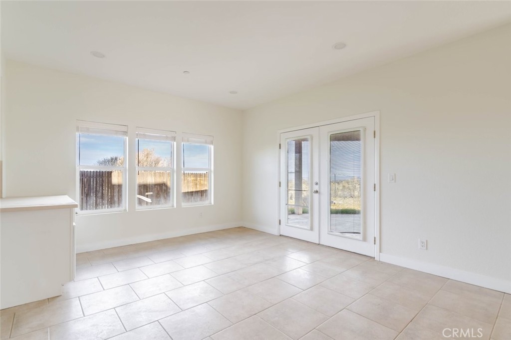 2575 Rale Drive Palmdale, CA 93550 - Photo 8 of 41 an empty room with windows