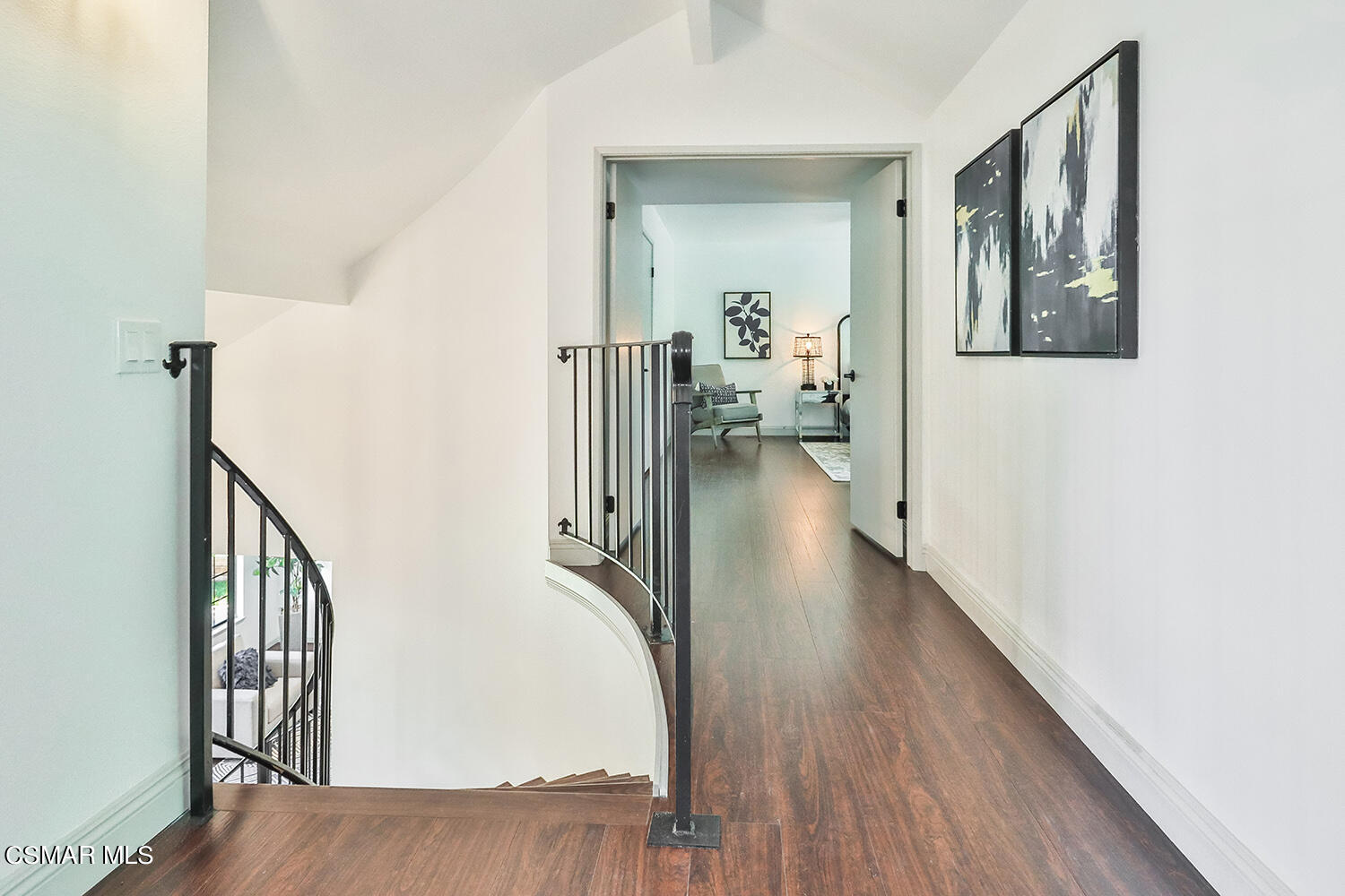 3091 Omega Avenue Simi Valley, CA 93063 - Photo 47 of 66 a view of a hallway with wooden floor and stairs