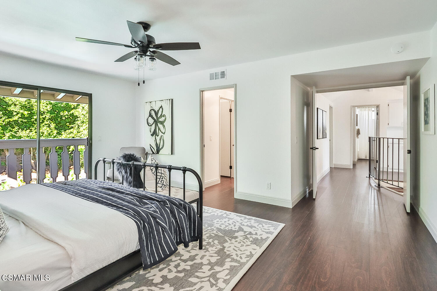 3091 Omega Avenue Simi Valley, CA 93063 - Photo 48 of 66 a bedroom with bed and wooden floor