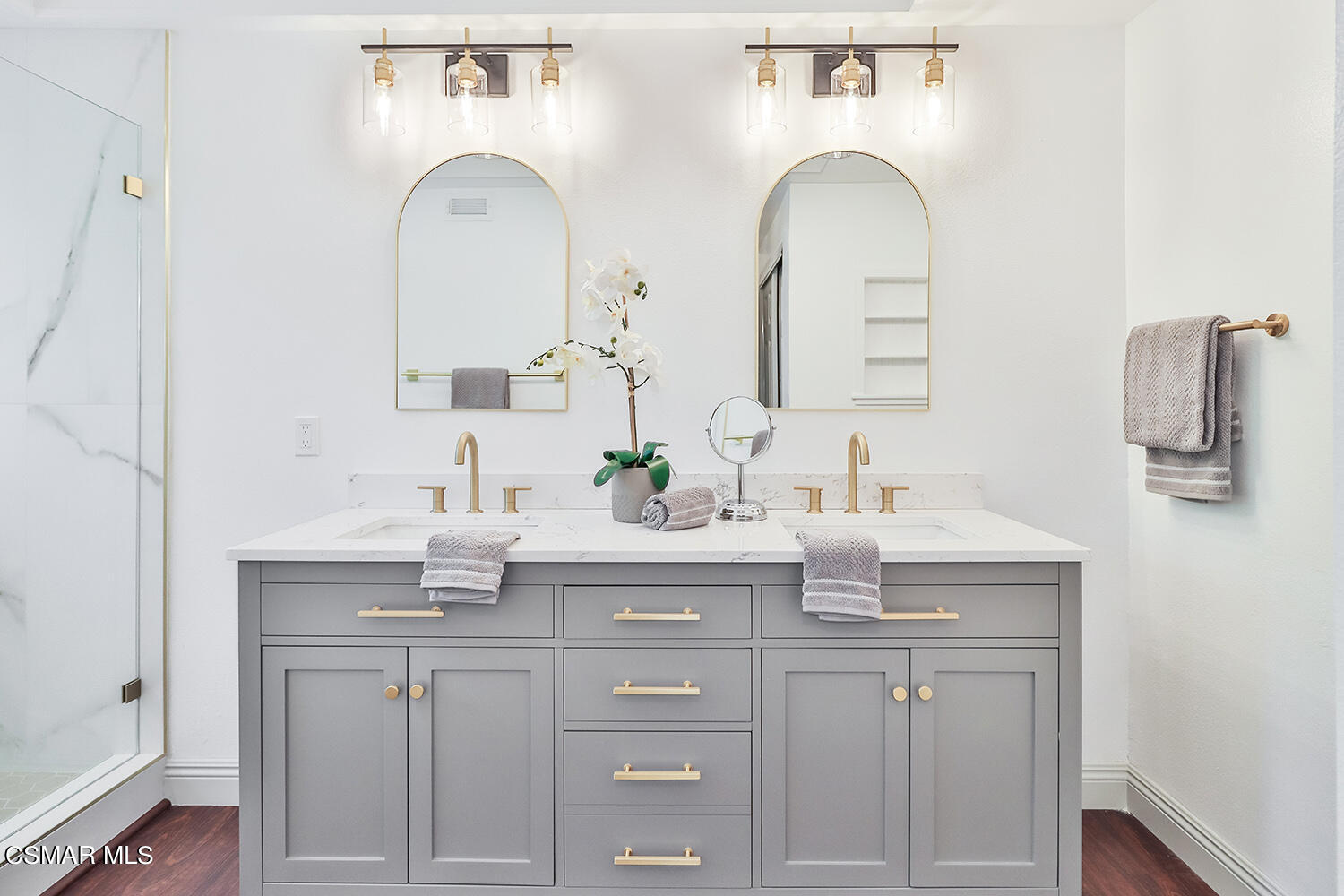 3091 Omega Avenue Simi Valley, CA 93063 - Photo 50 of 66 a bathroom with a sink and a mirror
