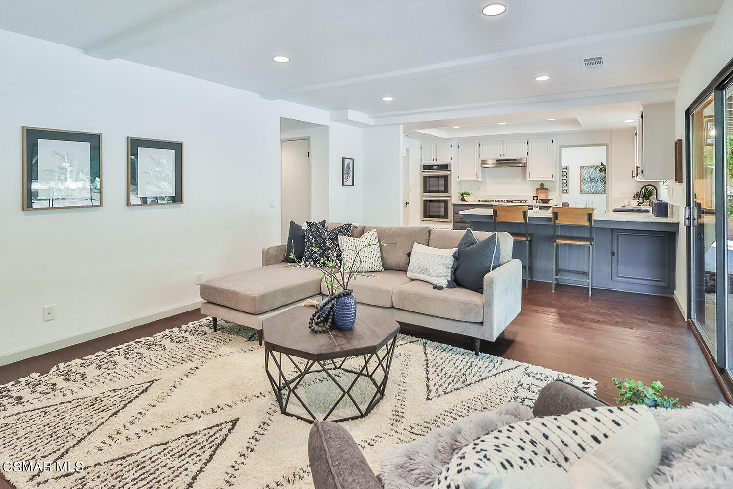 3091 Omega Avenue Simi Valley, CA 93063 - Photo 6 of 66 a living room with furniture and kitchen view