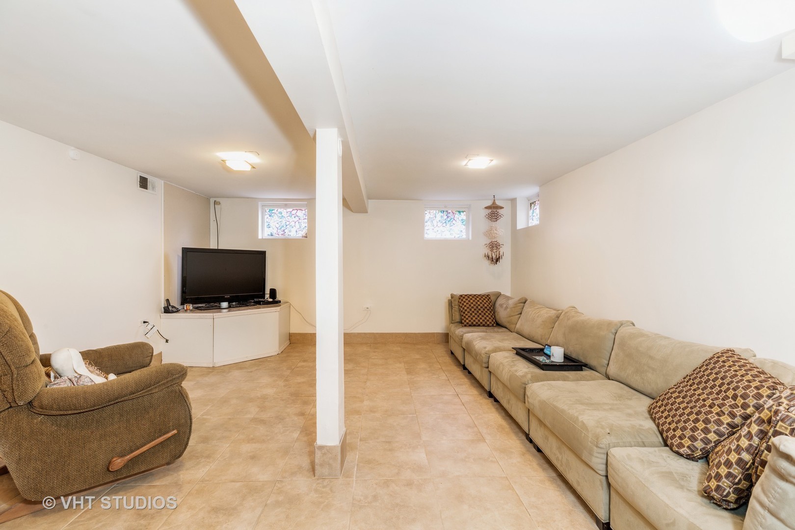 18326 Riegel Road Homewood, IL 60430 - Photo 13 of 17 a living room with furniture and a flat screen tv