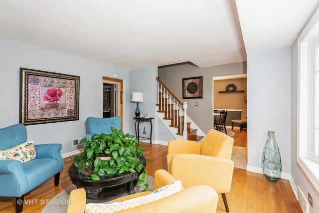 18326 Riegel Road Homewood, IL 60430 - Photo 2 of 17 a living room with furniture and a potted plant