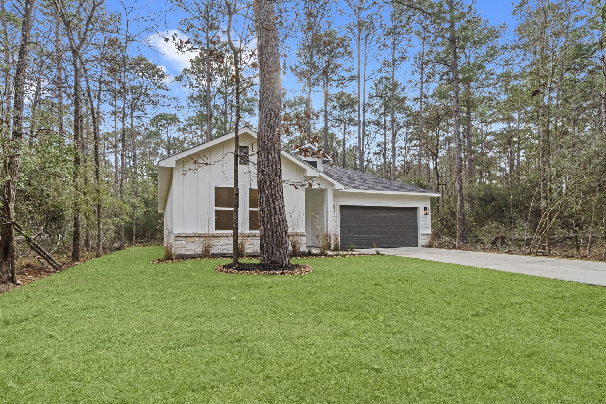 241 Clear Springs Trinity, TX 75862 - Photo 35 of 46 a view of a house with a yard and tree