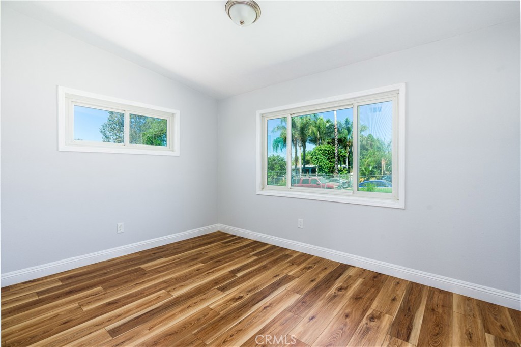 3254 Laurel Drive Riverside, CA 92509 - Photo 20 of 26 a view of a room with wooden floor and window