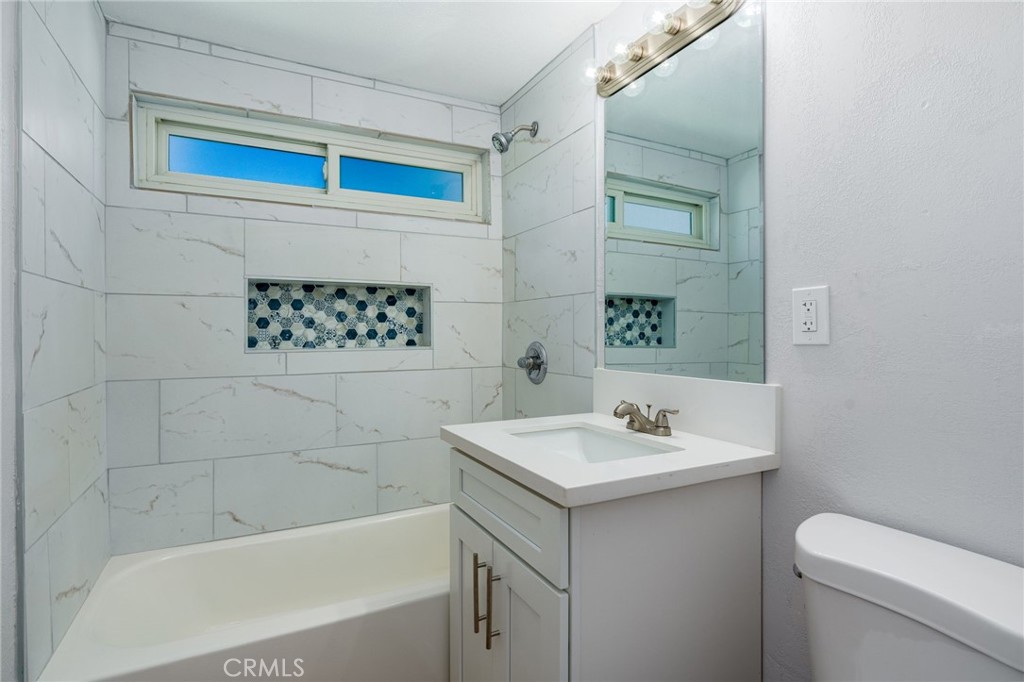 3254 Laurel Drive Riverside, CA 92509 - Photo 22 of 26 a bathroom with a sink a toilet and shower