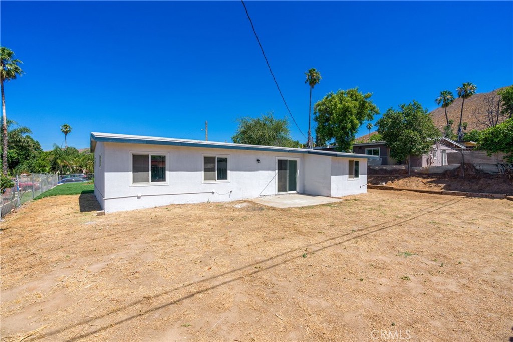 3254 Laurel Drive Riverside, CA 92509 - Photo 24 of 26 a house with trees in front of it