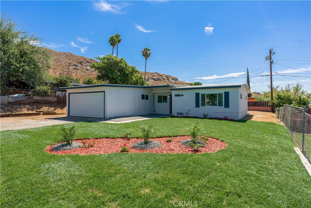 3254 Laurel Drive Riverside, CA 92509 - Photo 26 of 26 a front view of a house with a garden and yard