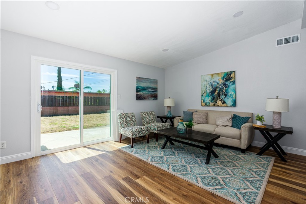 3254 Laurel Drive Riverside, CA 92509 - Photo 3 of 26 a living room with furniture and a wooden floor