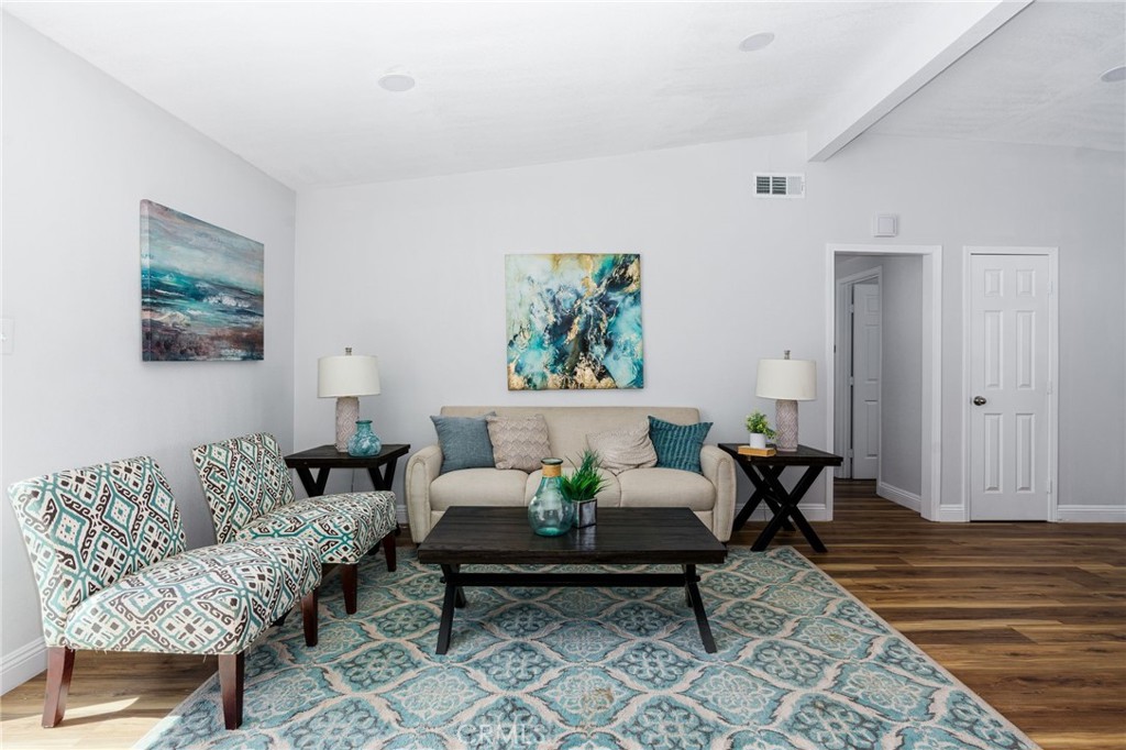 3254 Laurel Drive Riverside, CA 92509 - Photo 4 of 26 a living room with furniture and wooden floor