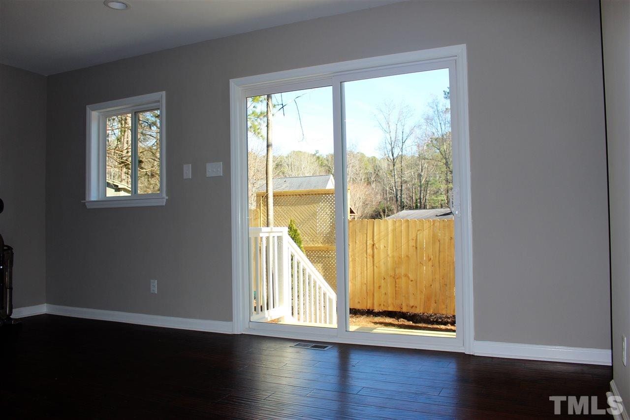Another View of Dining Area, view of Backyard... Sliding doors, TONS of natural light! Bright area! GORGEOUS!