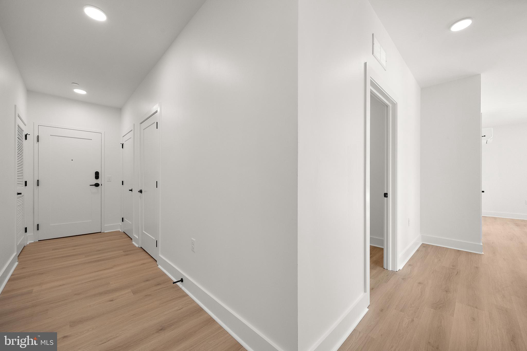 801 North Market Street, Unit 305 Wilmington, DE 19801 - Photo 3 of 11 a view of a room with wooden floor