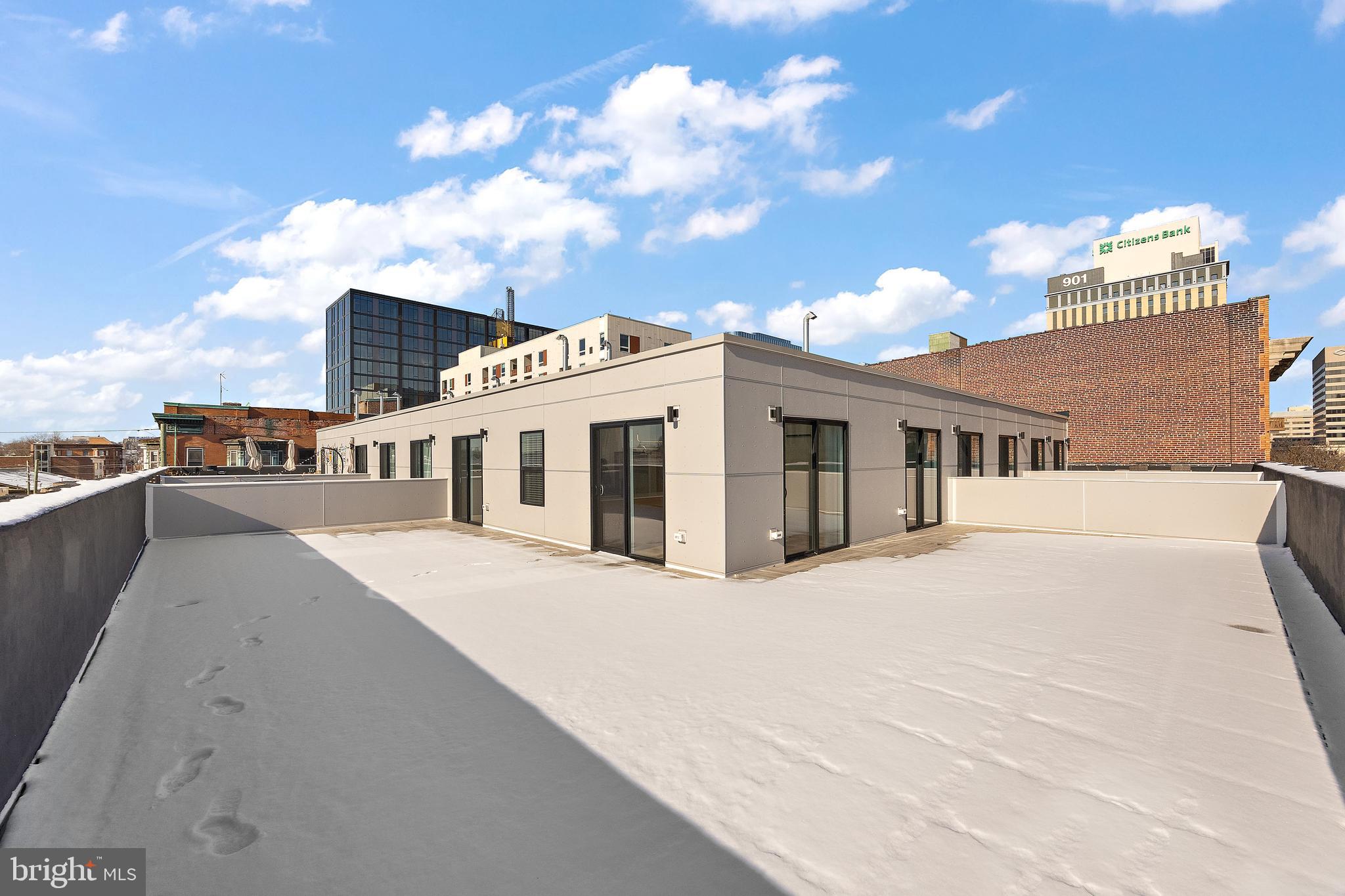 801 North Market Street, Unit 305 Wilmington, DE 19801 - Photo 10 of 11 a front view of a house with yard