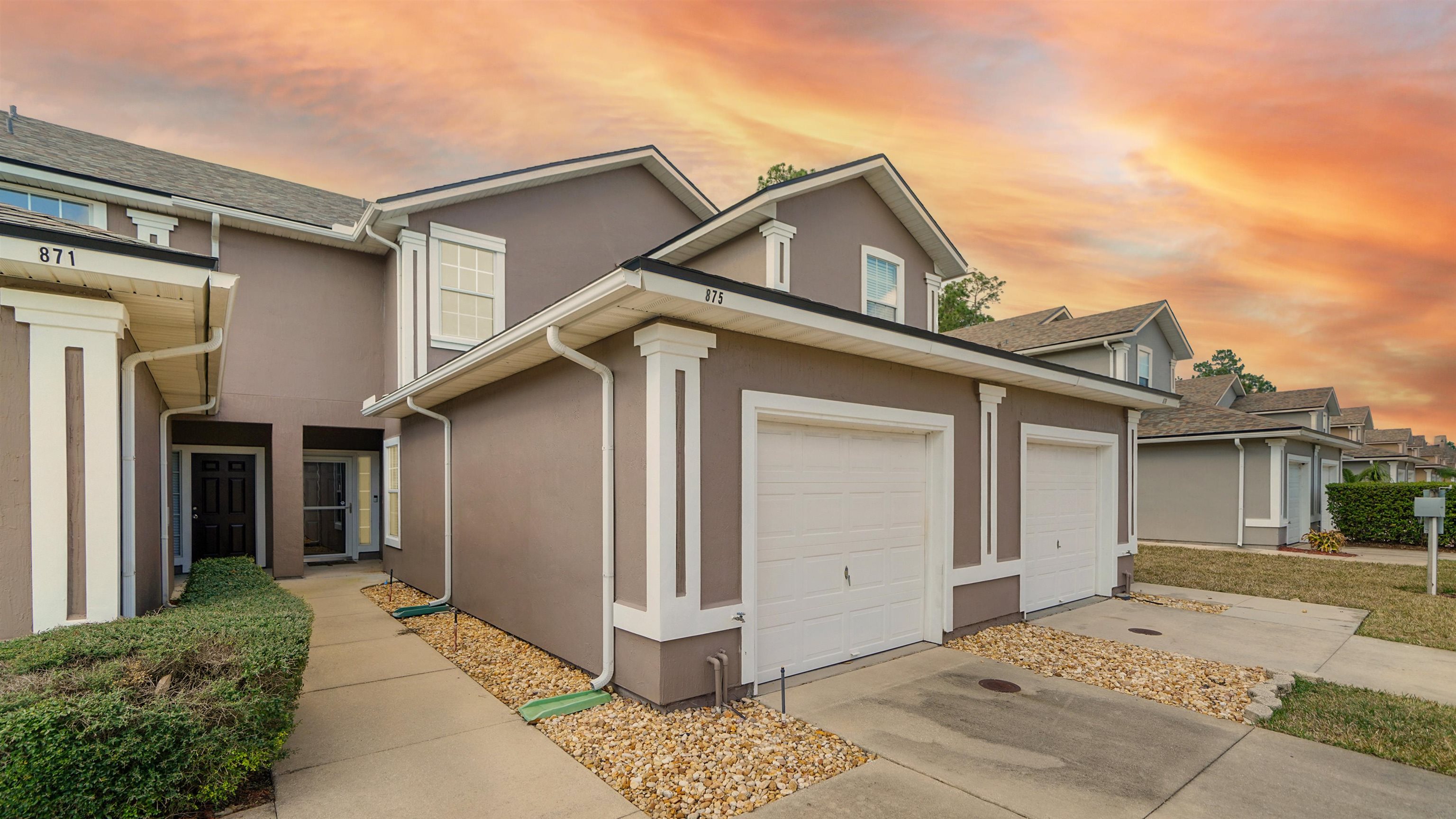 875 Scrub Jay Drive St. Augustine, FL 32092 - Photo 1 of 28 a view of a house with a yard