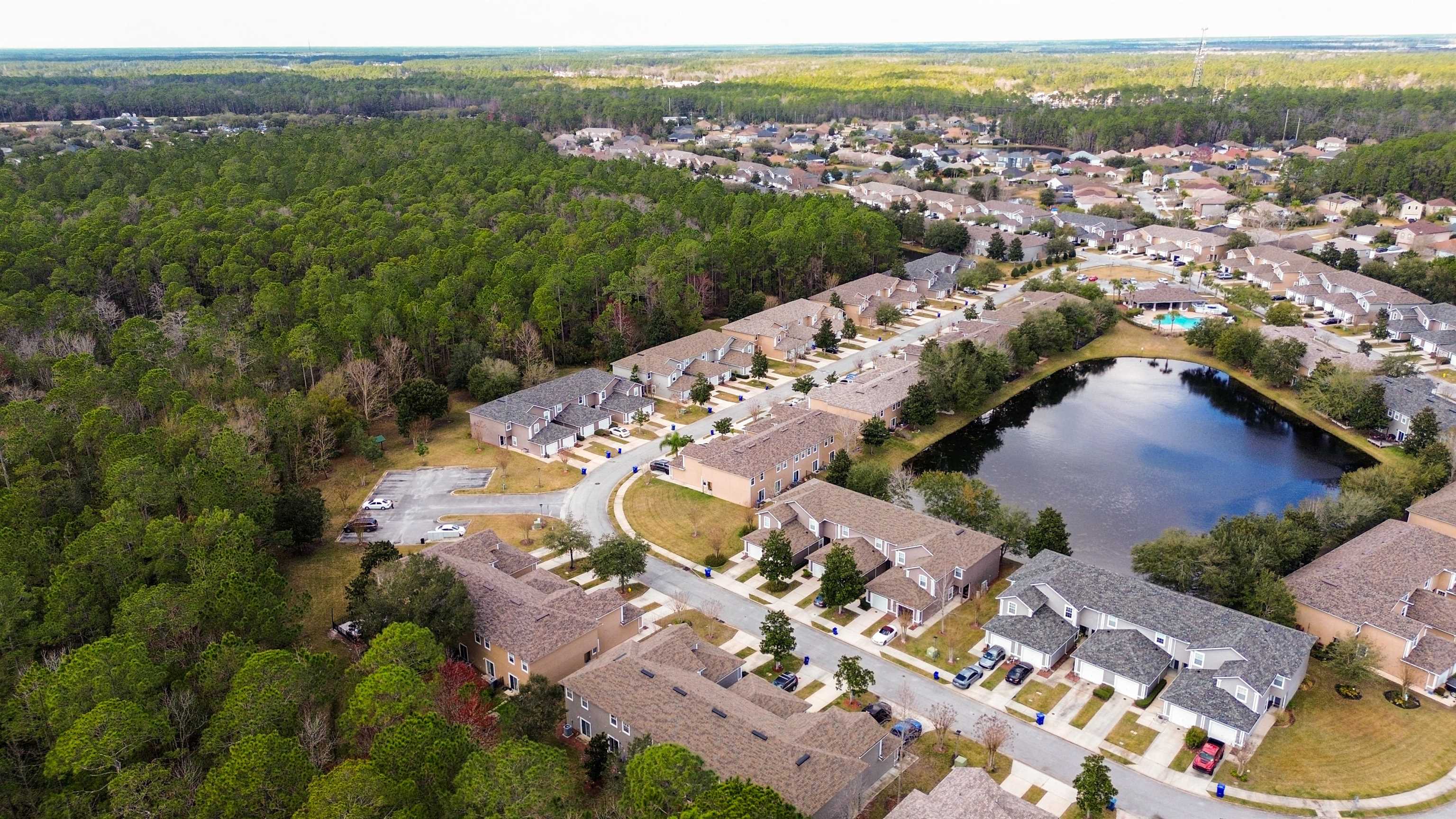 875 Scrub Jay Drive St. Augustine, FL 32092 - Photo 23 of 28 an aerial view of a house with a yard