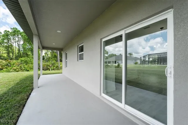 a view of a fountain in front of a house