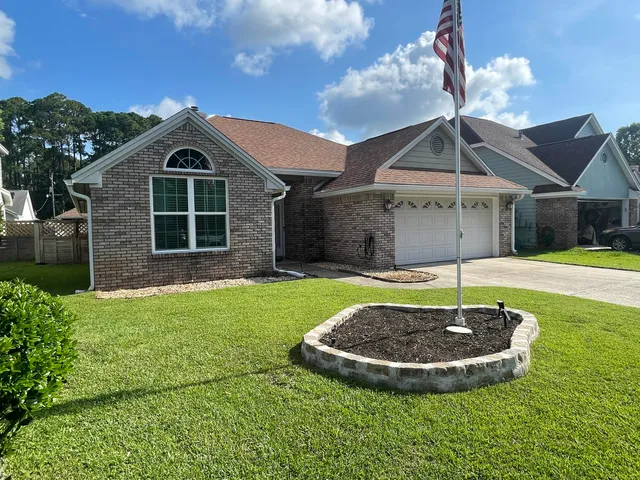 a view of a house with a swimming pool