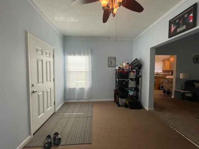 a view of a room with toys and a window