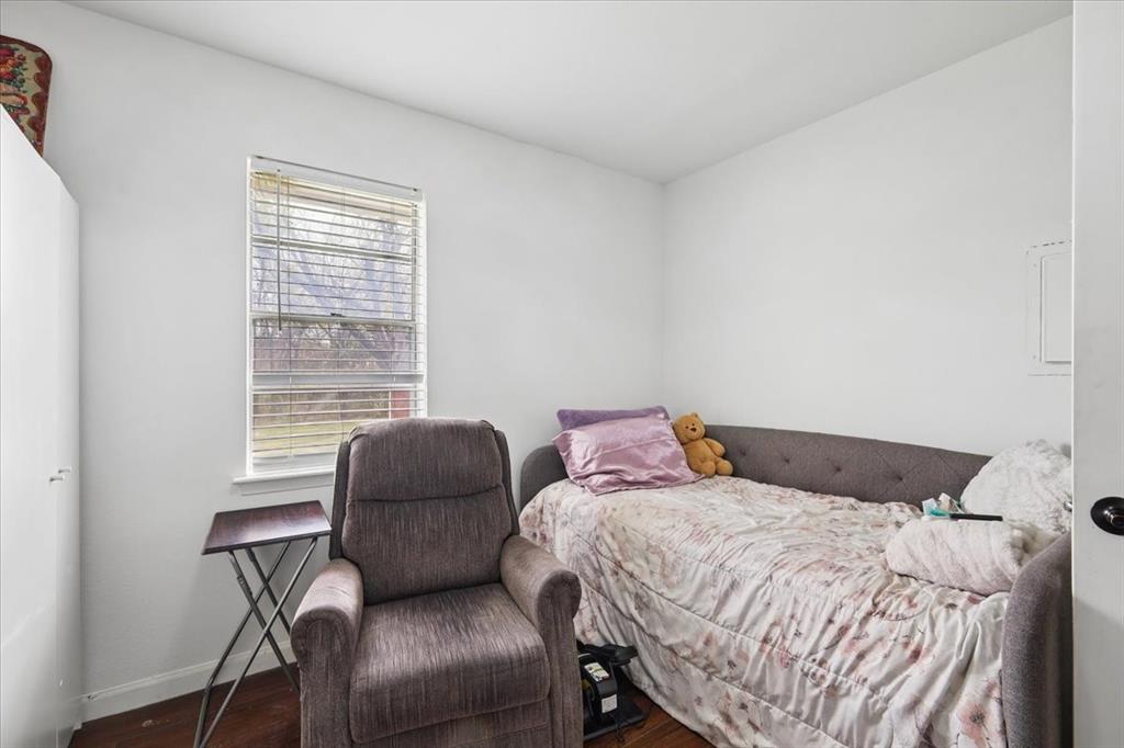 2508 West Rochelle Road Irving, TX 75062 - Photo 13 of 19 a bedroom with a bed and a window
