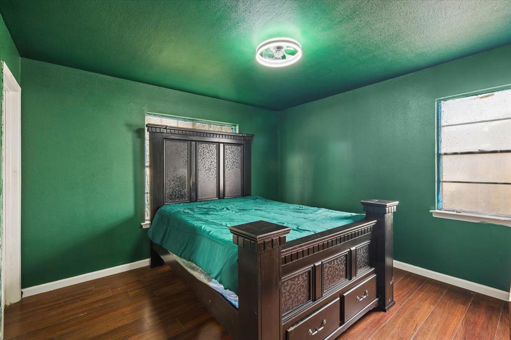 2508 West Rochelle Road Irving, TX 75062 - Photo 8 of 19 a bedroom with a bed and a window