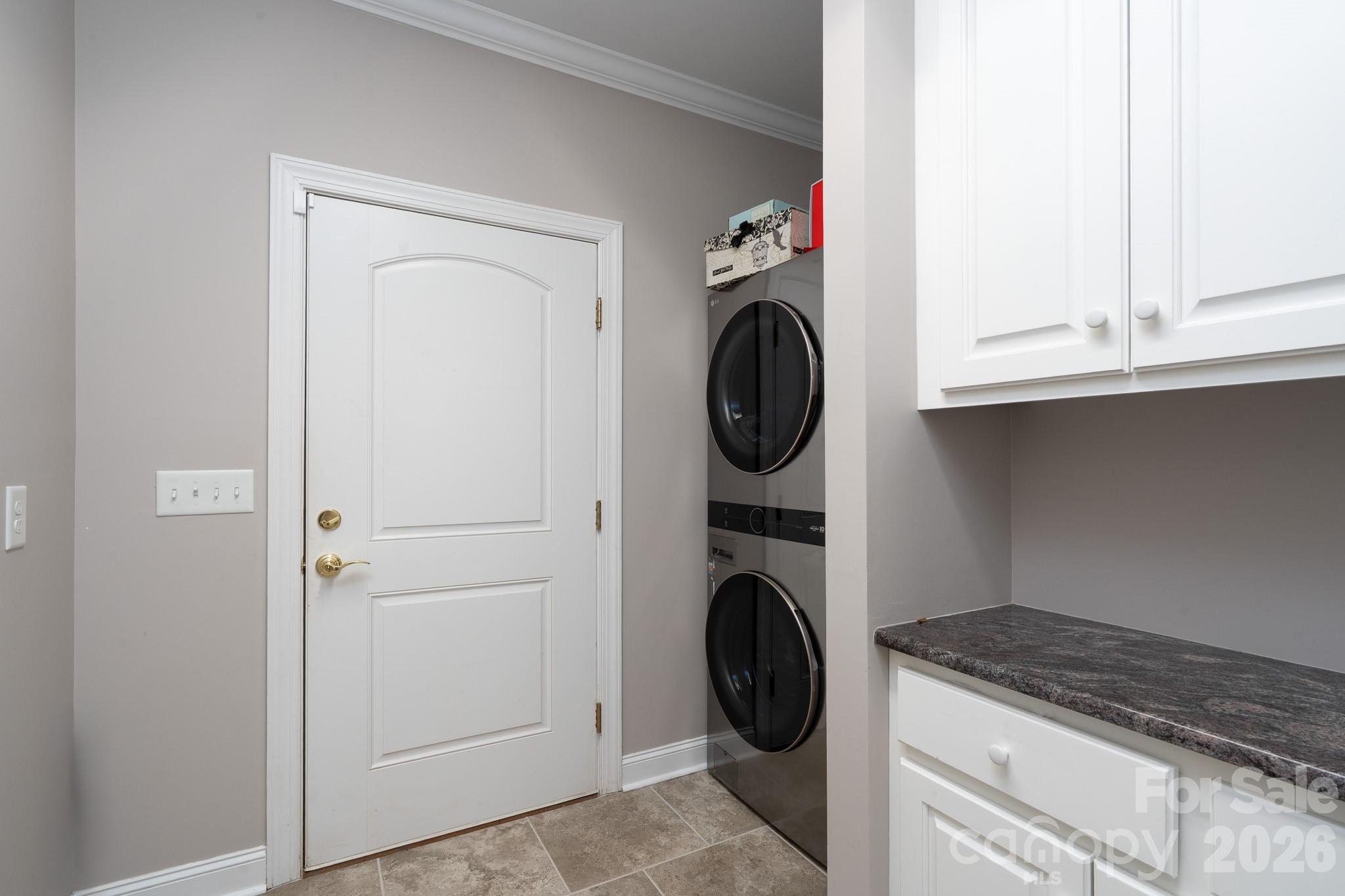 338 PLANTATION Way Mount Gilead, NC 27306 - Photo 28 of 48 a utility room with dryer and washer