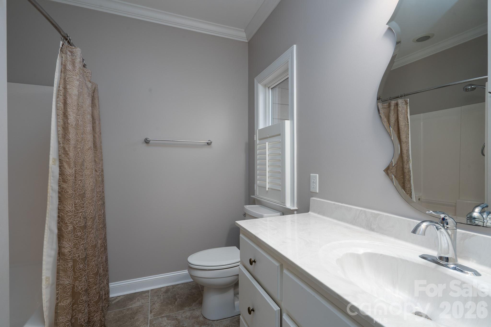 338 PLANTATION Way Mount Gilead, NC 27306 - Photo 31 of 48 a bathroom with a granite countertop sink toilet and shower