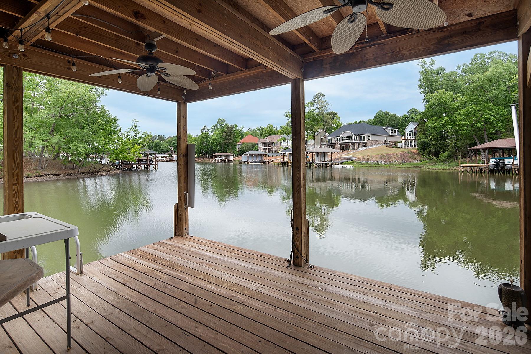 338 PLANTATION Way Mount Gilead, NC 27306 - Photo 8 of 48 a lake view with a lake view