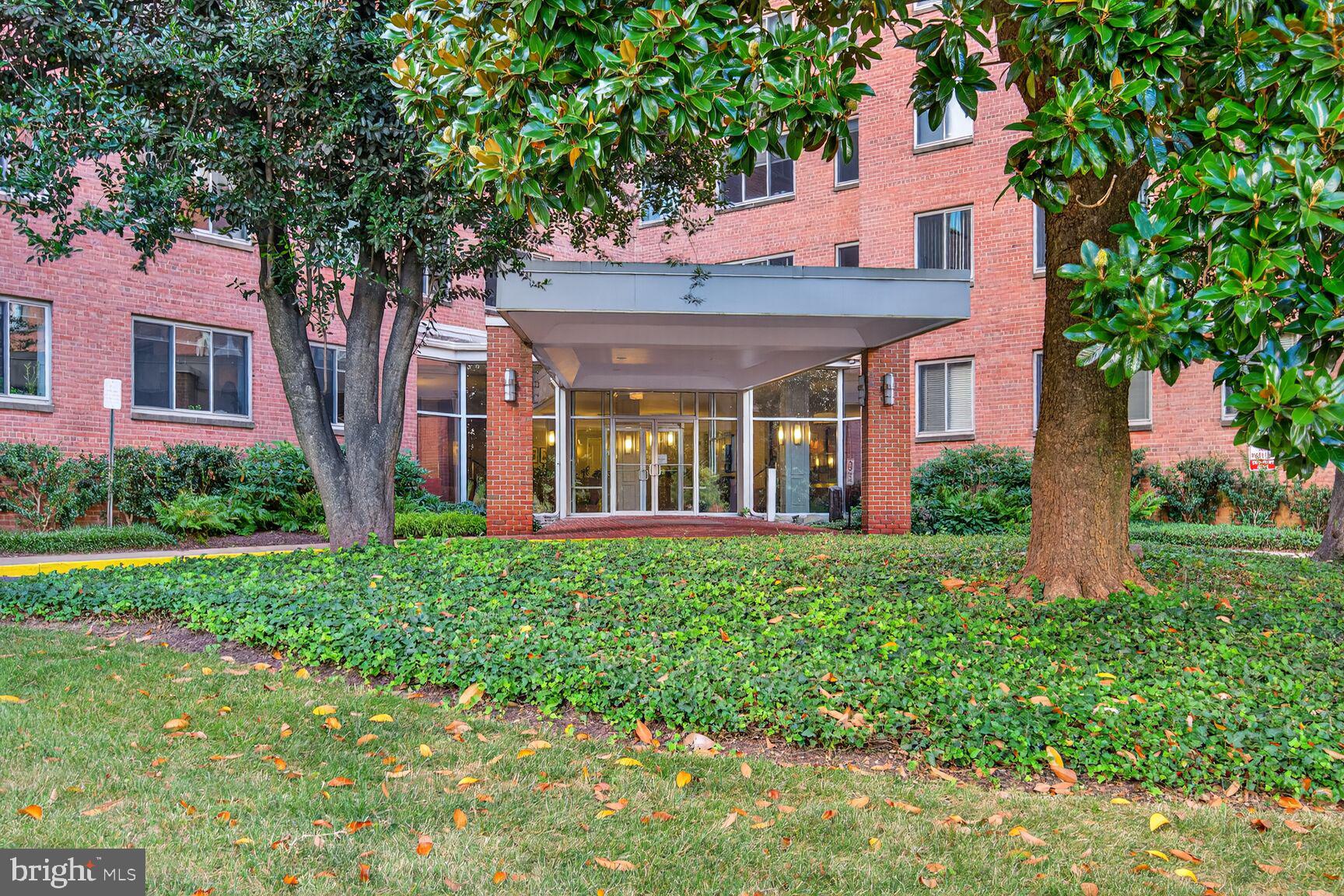 3000 Spout Run Parkway, Unit A306 Arlington, VA 22201 - Photo 1 of 26 a front view of a house with garden