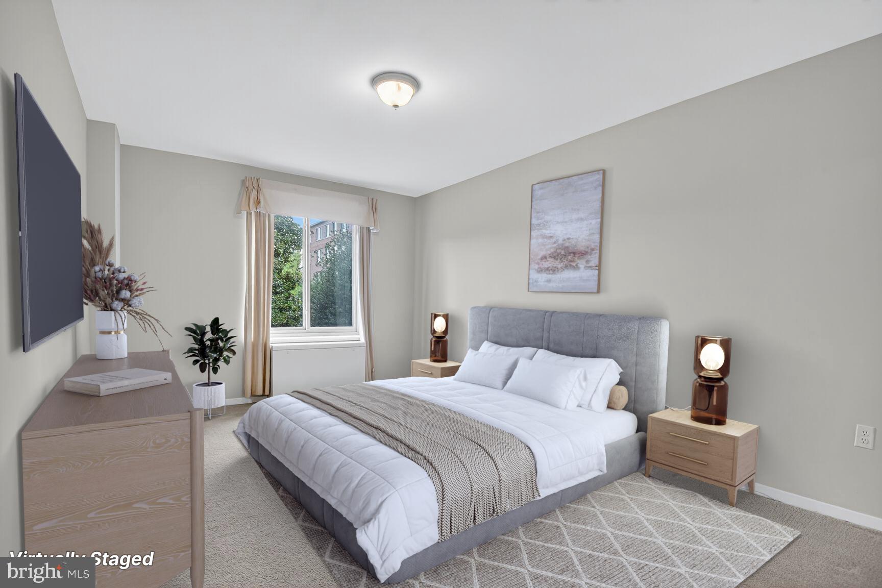 3000 Spout Run Parkway, Unit A306 Arlington, VA 22201 - Photo 14 of 26 a bedroom with bed and window