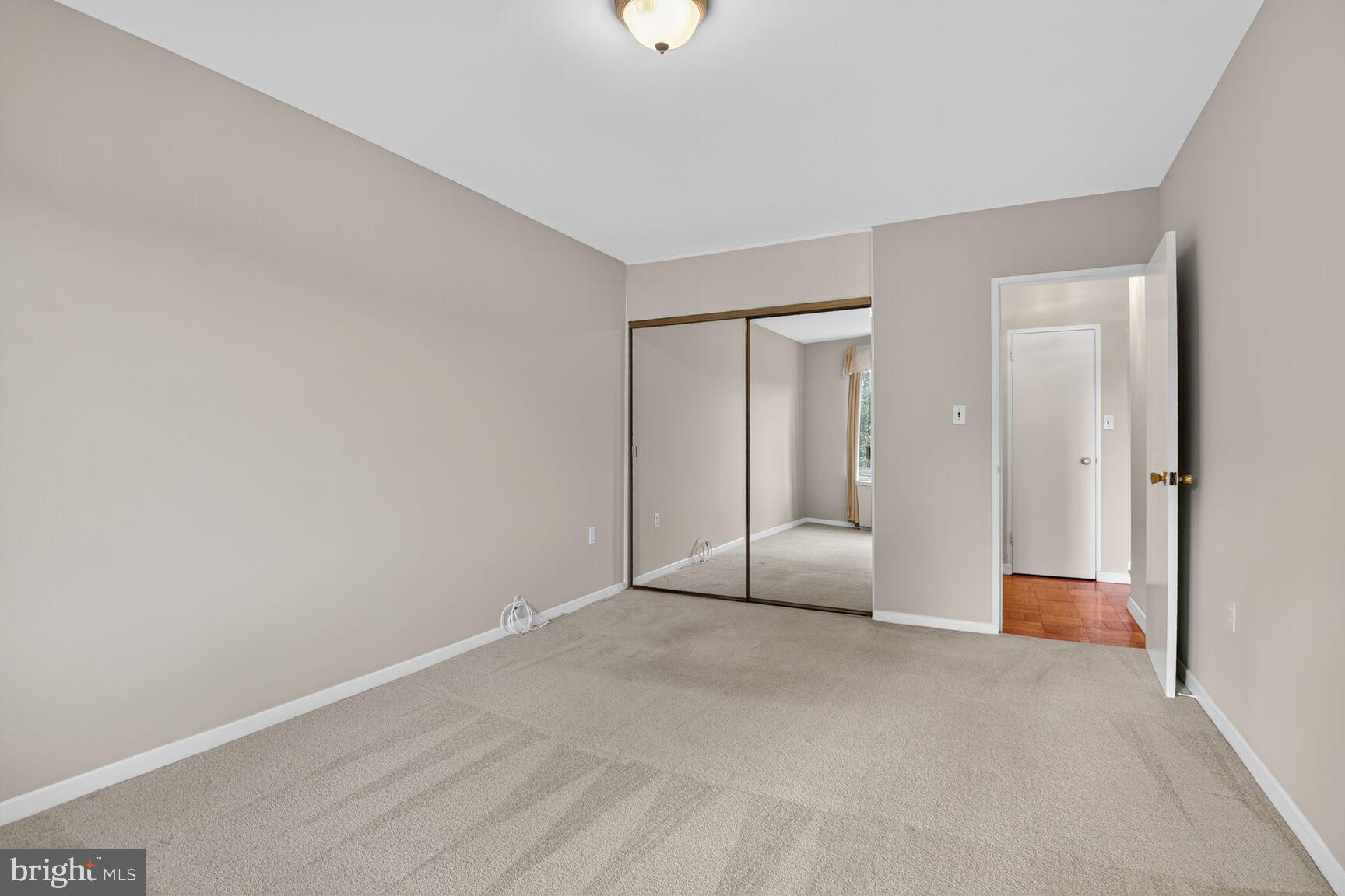 3000 Spout Run Parkway, Unit A306 Arlington, VA 22201 - Photo 15 of 26 a view of empty room with wooden floor