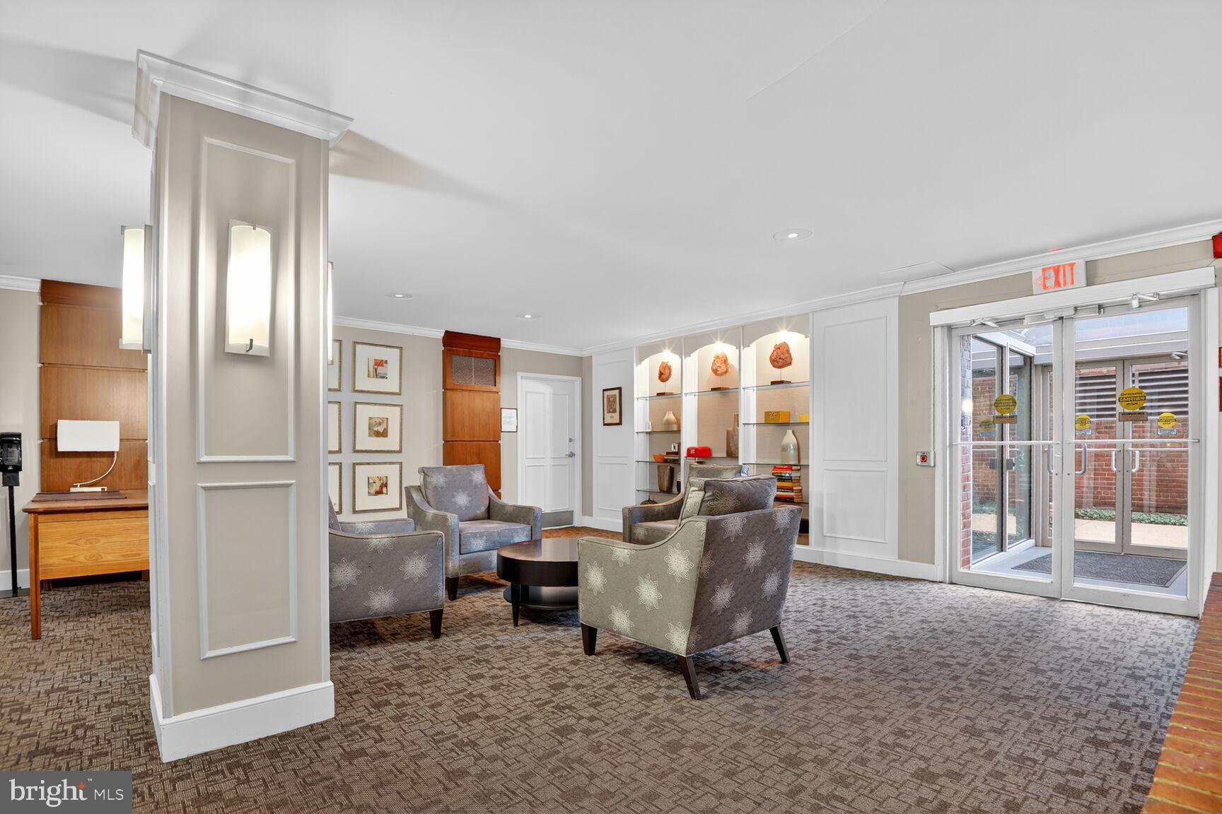 3000 Spout Run Parkway, Unit A306 Arlington, VA 22201 - Photo 18 of 26 a living room with furniture and a floor to ceiling window