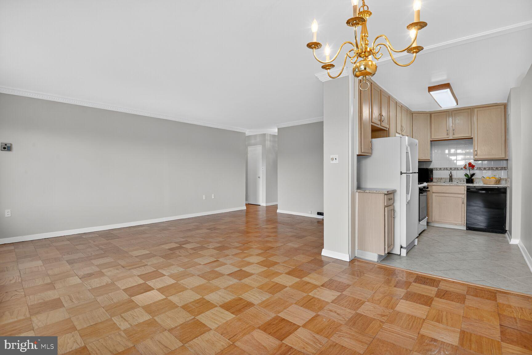 3000 Spout Run Parkway, Unit A306 Arlington, VA 22201 - Photo 8 of 26 a view of a kitchen with a stove