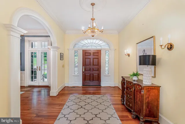 a kitchen with a stove a sink and a refrigerator