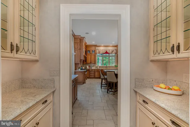 a view of a swimming pool with a yard