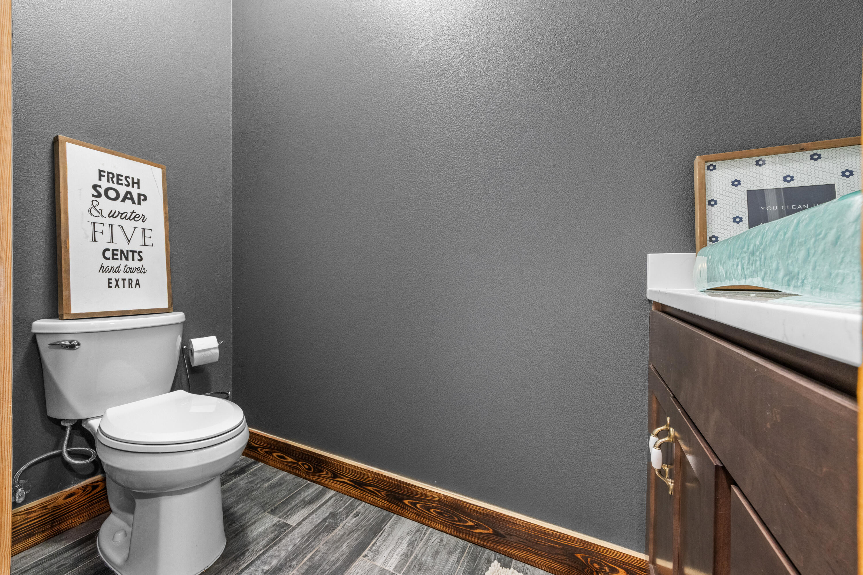 981 East Chestnut Avenue Crestview, FL 32539 - Photo 38 of 80 a bathroom with a toilet and a sink