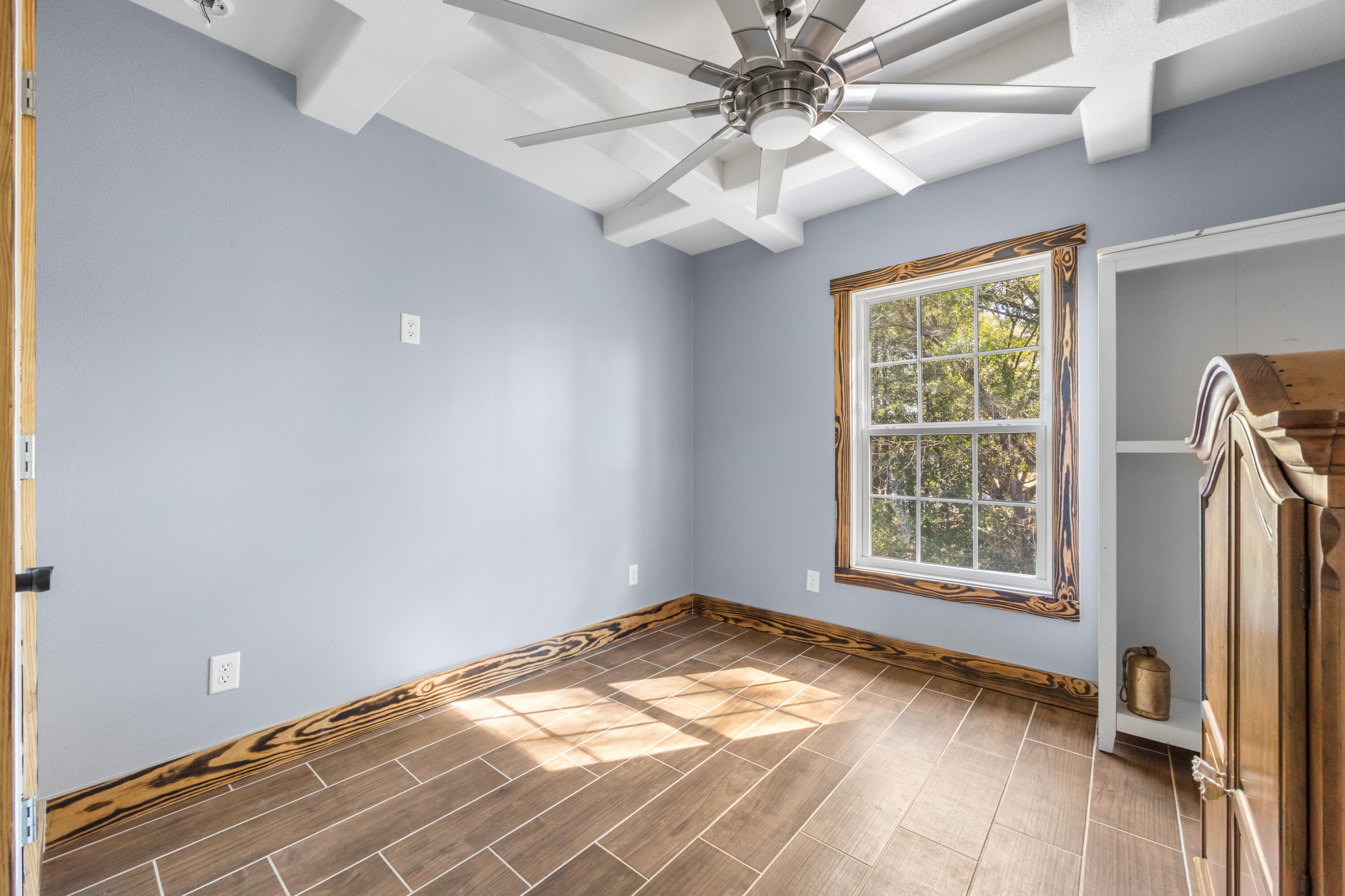 981 East Chestnut Avenue Crestview, FL 32539 - Photo 50 of 80 an empty room with windows and fan