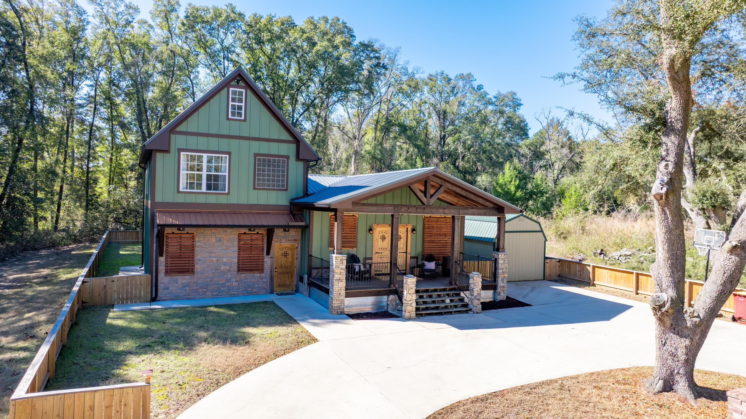 981 East Chestnut Avenue Crestview, FL 32539 - Photo 72 of 80 a view of a house with a yard