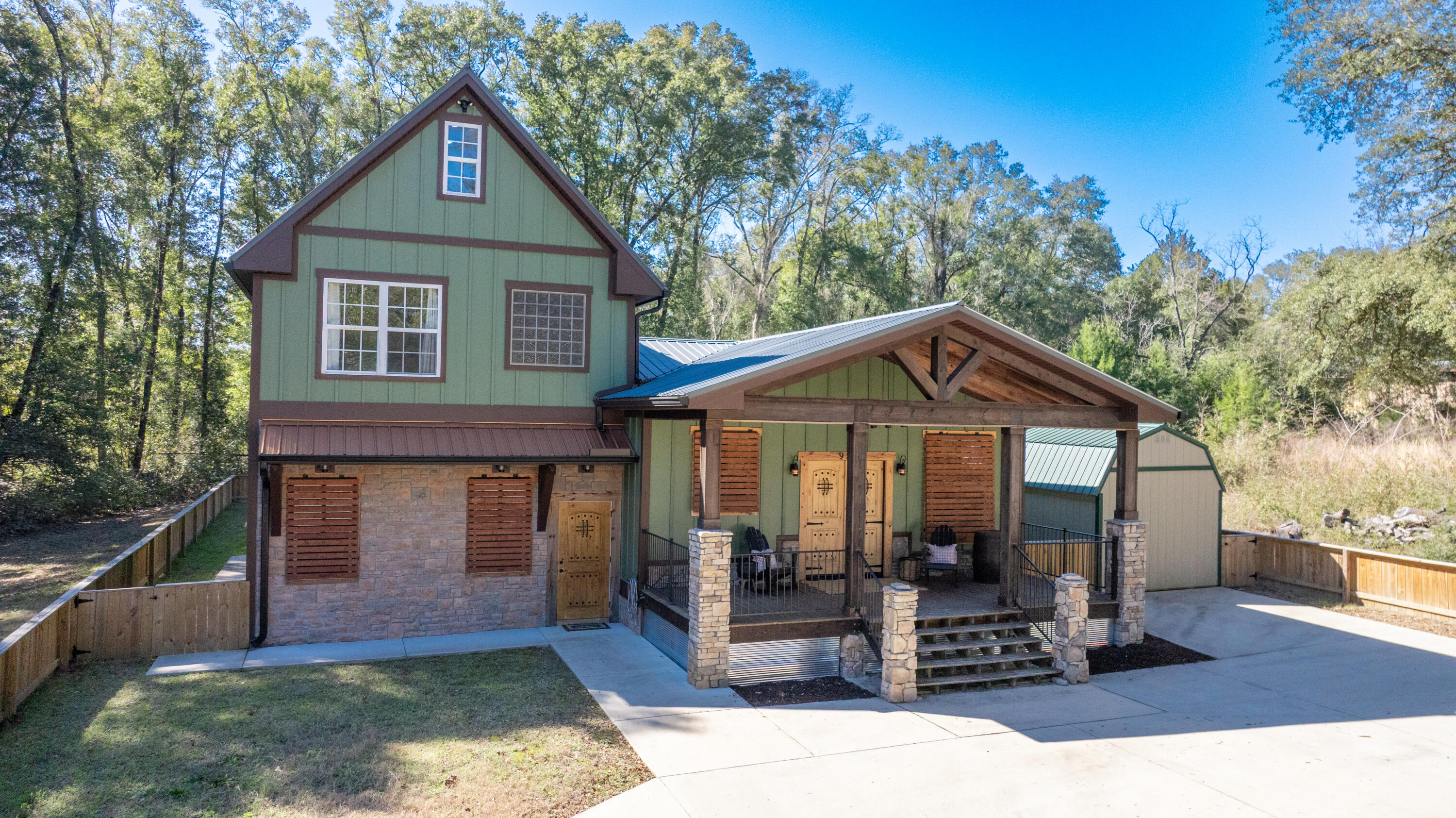 981 East Chestnut Avenue Crestview, FL 32539 - Photo 79 of 80 a front view of a house with a yard