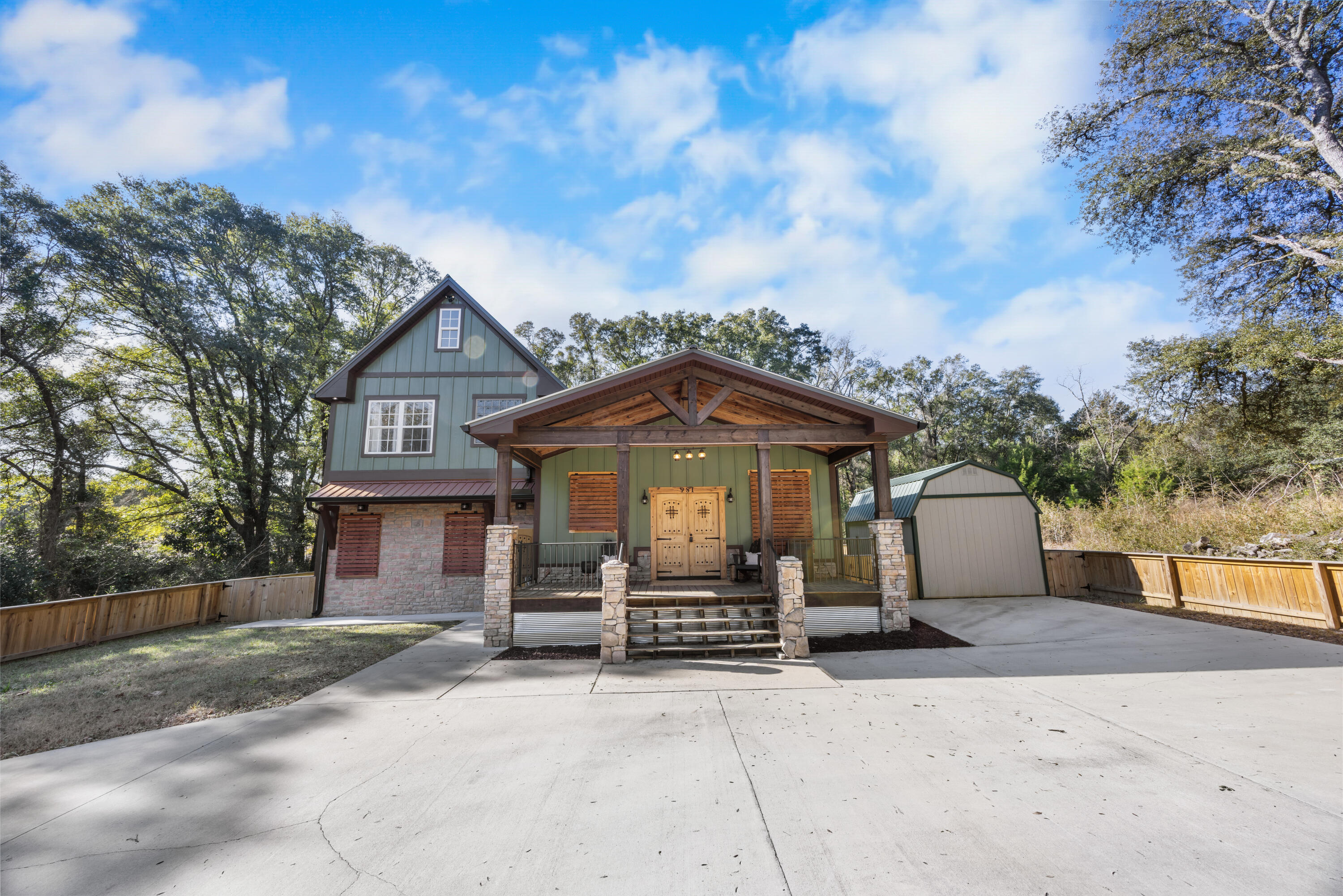 981 East Chestnut Avenue Crestview, FL 32539 - Photo 9 of 80 a front view of a house with a yard