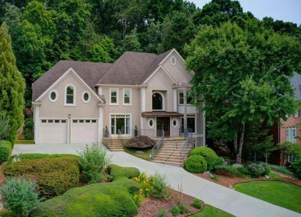 3850 Glenhurst Drive Smyrna, GA 30080 - Photo 1 of 43 a front view of a house with a yard
